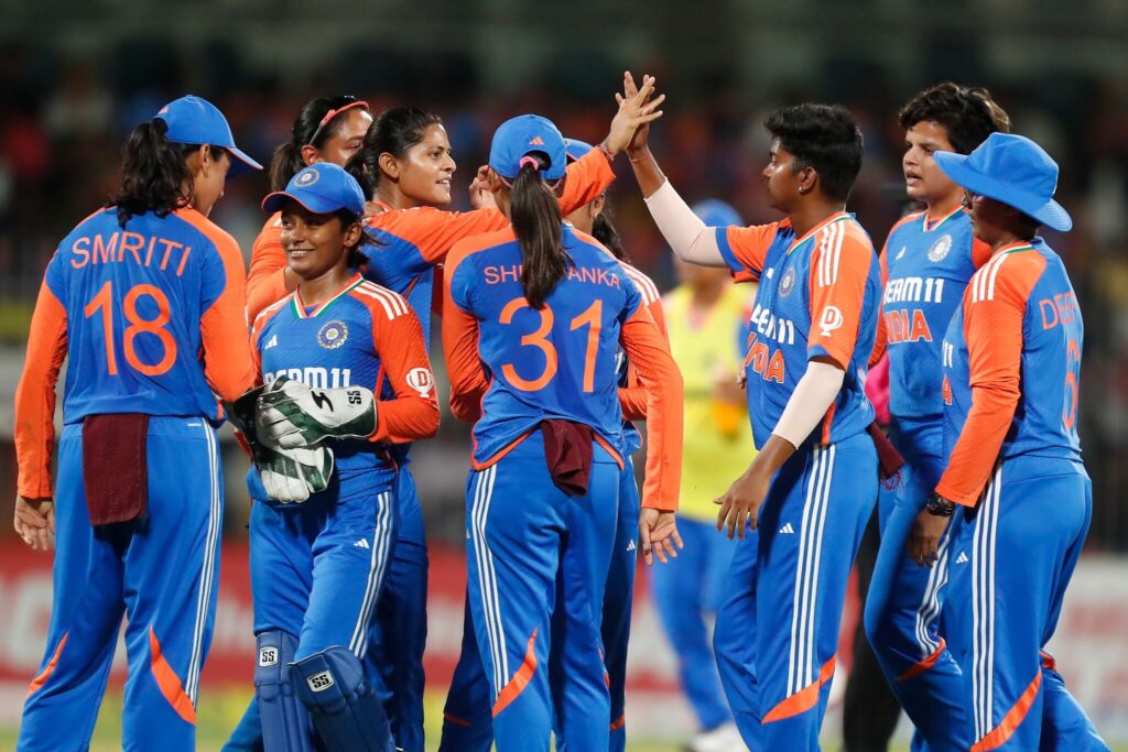 India Women's Cricket Team on ground.