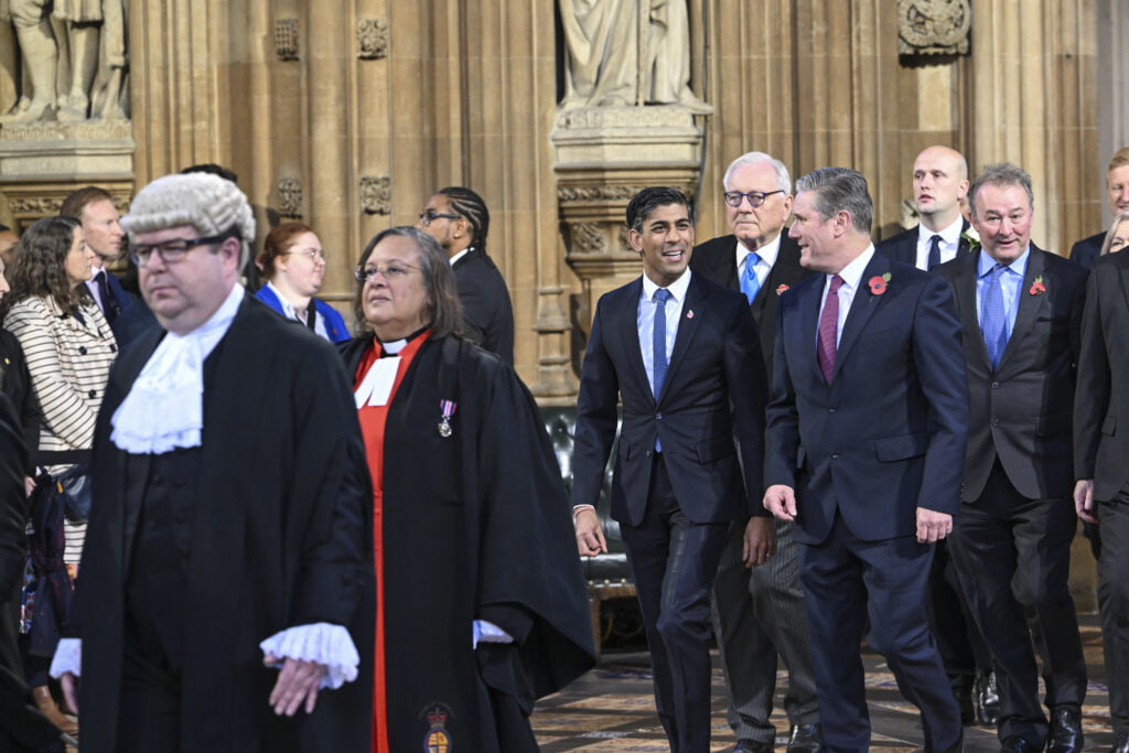 The Prime Minister, Rishi Sunak, Leader of the Opposition, Sir Keir Starmer and other Members and Commons officials make their way to the House of Lords to listen to the King's Speech. Photo Credit : UK Parliament , CC BY-NC-ND 2.0