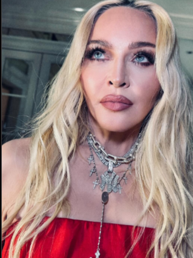 Left Side: Micelle Pfeiffer's Catwoman Photo source: DC (Youtube) Right Side: Madonna Photo Source: Madona (Instagram)