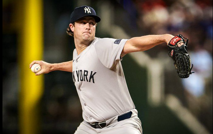 Baseball player throwing the ball.