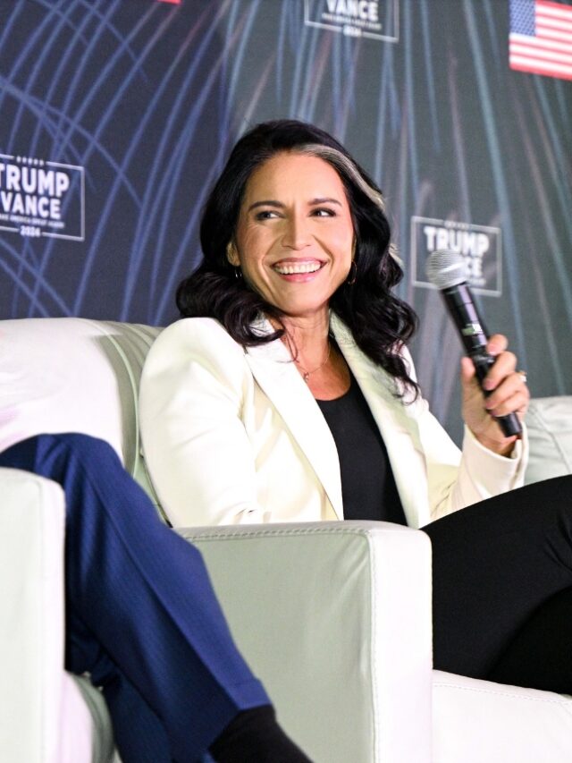 Tulsi Gabbard is sitting on the couch.