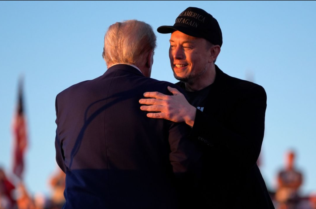 Elon Musk is hugging Donald Trump.