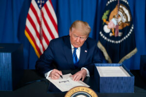 Representative Image. President Trump Signs H.R. 133. Photo Source: Trump White House Archived