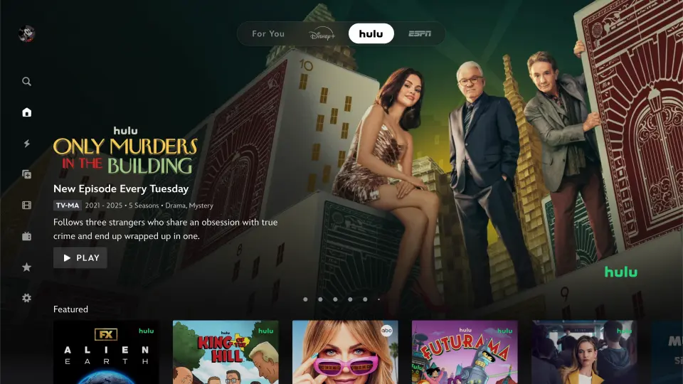 New Disney+ interface showing Only Murders in the Building featuring Steve Martin, Martin Short, and Selena Gomez on the hero carousel with navigation tabs for Disney+, Hulu, and ESPN above