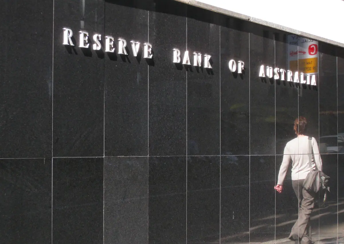Reserve Bank of Australia building facade with official logo under daylight, representing monetary policy and inflation control focus.