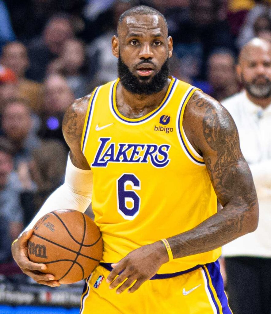 LeBron James in a Los Angeles Lakers uniform looks on during a game against the Cleveland Cavaliers on March 21, 2022.