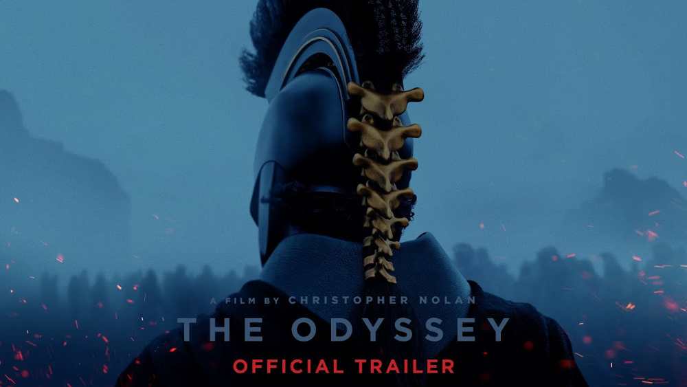 Official trailer promotional image for Christopher Nolan's The Odyssey showing Matt Damon as Odysseus with the Trojan Horse and a smoke-filled battlefield in the background.