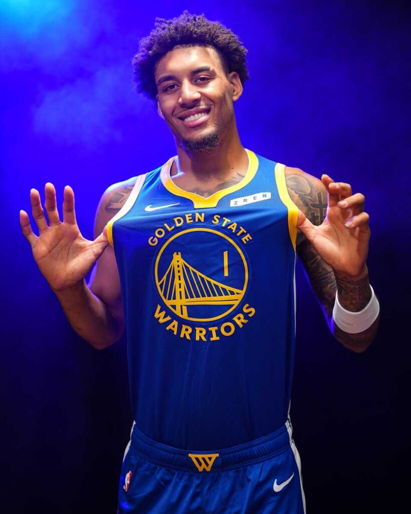 Yaxel Lendeborg of the Golden State Warriors holds up the NBA Summer League MVP trophy and championship ring after defeating the Memphis Grizzlies 94-90 in the 2026 Summer League championship game in Las Vegas.