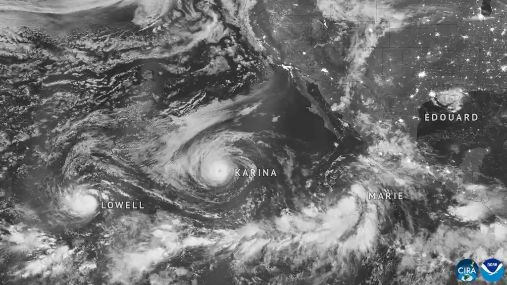 Satellite view of tropical cyclone cloud systems over the Pacific Ocean; representative image that does not depict Champi
