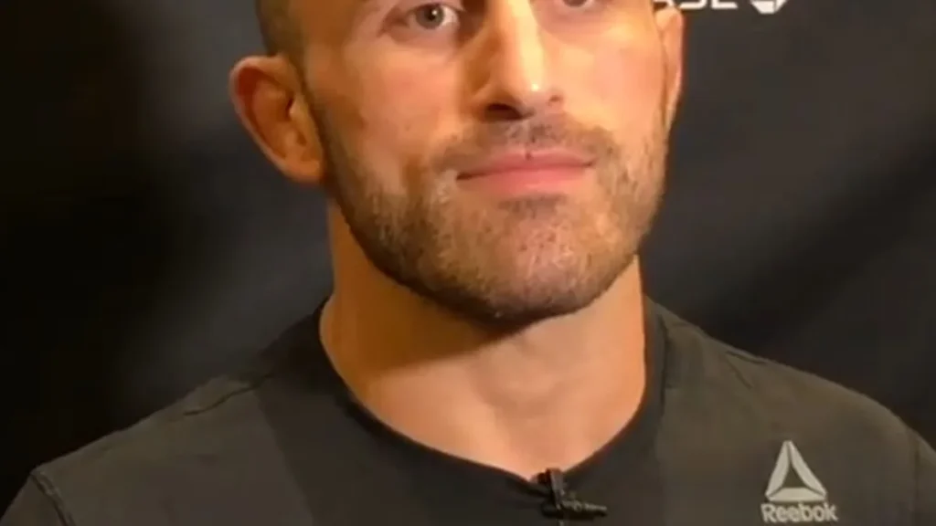 Professional fighter Alexander Volkanovski speaking during an indoor UFC media event.