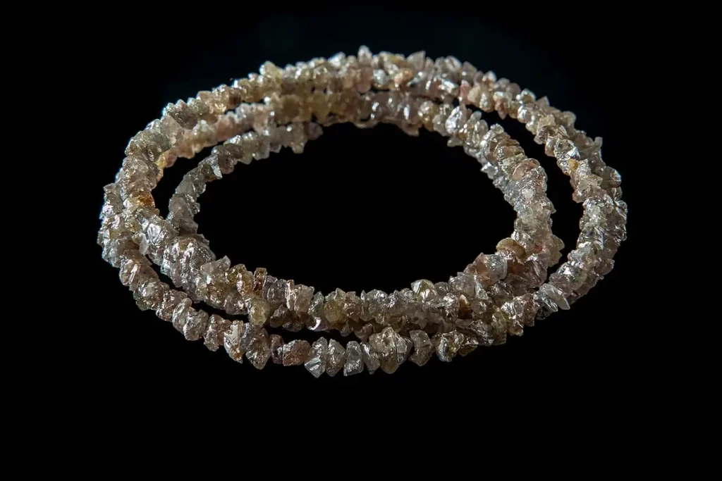 Diamond necklace on a black background.