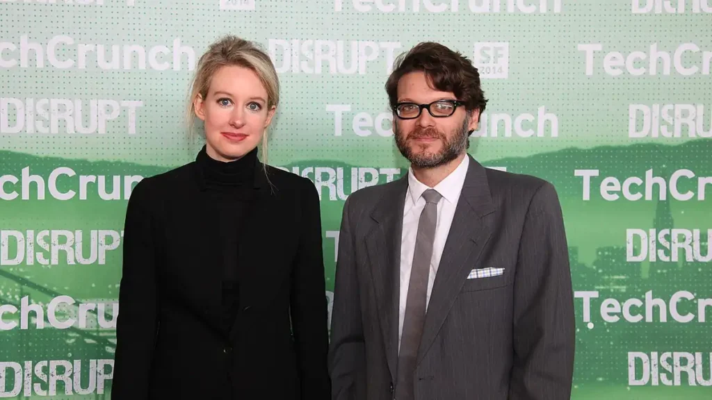 Elizabeth Holmes speaking at a technology conference.