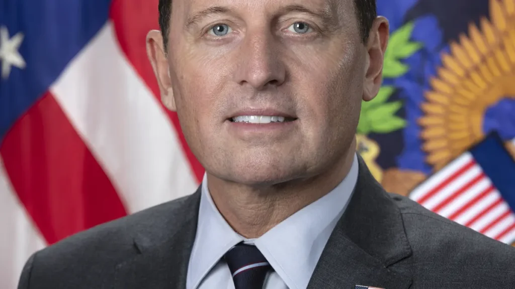 Official portrait of Richard Grenell in formal business attire.