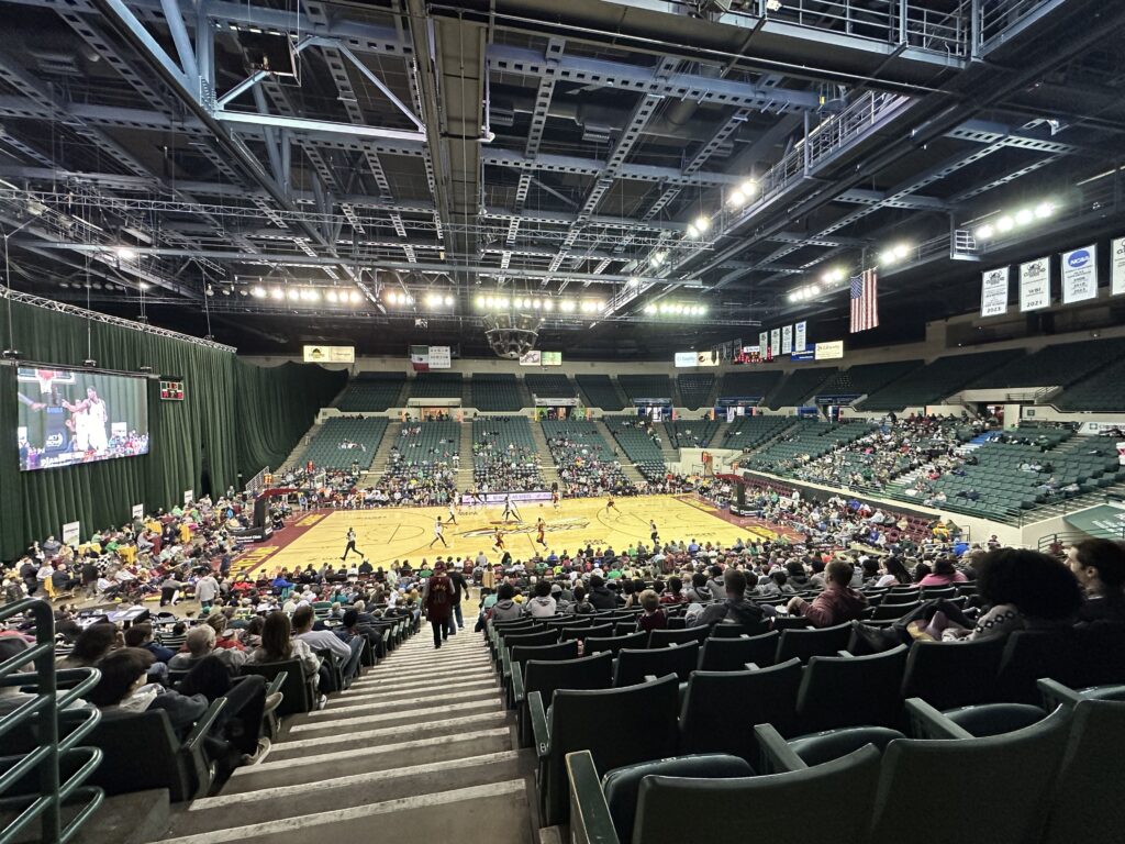 Wide shot of the indoor seating bowl and open arena floor inside the Wolstein Center sports facility in Cleveland Ohio