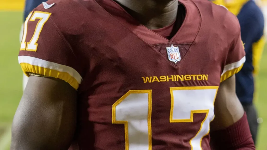 Washington wide receiver Terry McLaurin running an offensive route in uniform.